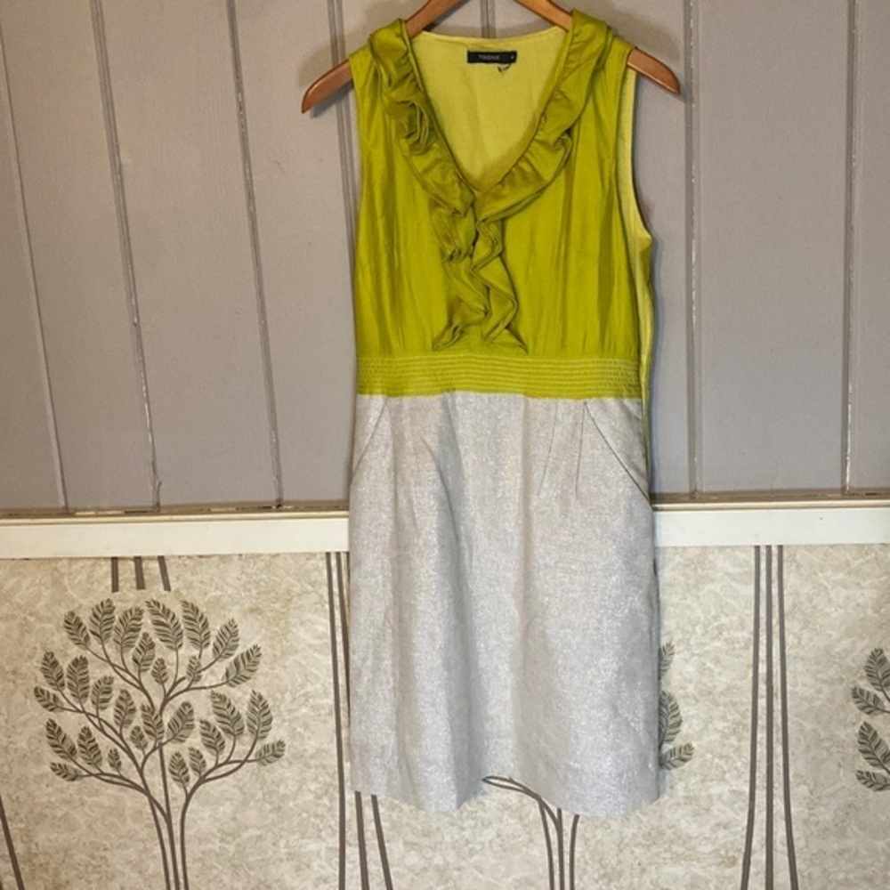 THEME  M sleeveless ruffle to and sparkle bottom dress
